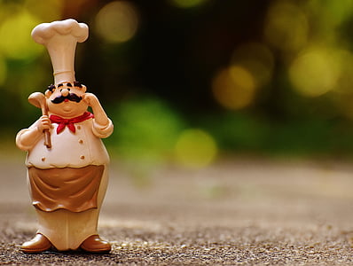 shallow focus chef ceramic figurine thumbnail