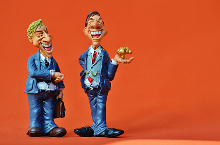 two smiling man figurines thumbnail
