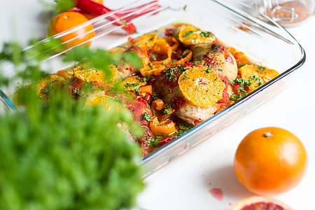 Chicken legs with tomatoes, peppers and oranges thumbnail