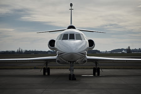 White Airplane on Road thumbnail