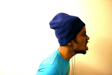 man wearing blue knitted cap thumbnail