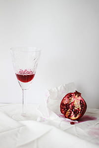 sliced red fruit beside the wine glass thumbnail