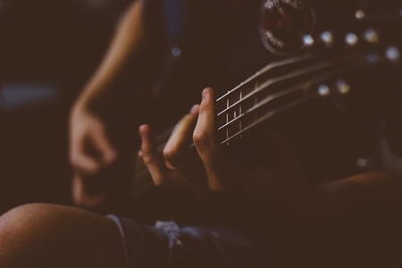 person playing guitar thumbnail