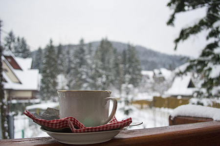 white ceramic cup on saucer thumbnail