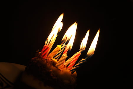 assorted-colored candles lighten thumbnail