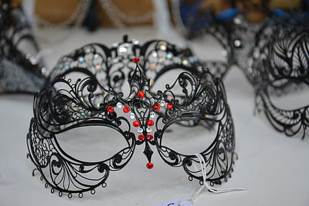 focus photo of black masquerade thumbnail