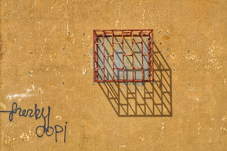 closeup photo of brown metal window grille thumbnail