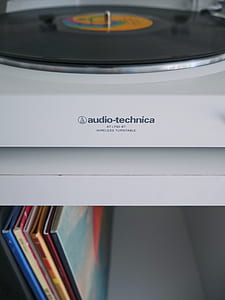 photo of white Audio-Technica wireless turntable on top of white shelf thumbnail