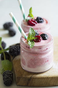 two clear glasses filled with strawberry ice creams thumbnail