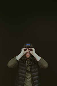 person looking at camera thumbnail