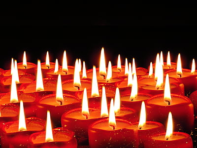 lighted red candles thumbnail