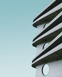 white and gray building under skies thumbnail