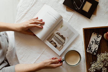 Woman read book and drink coffee thumbnail