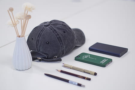 gray cap on white surface thumbnail