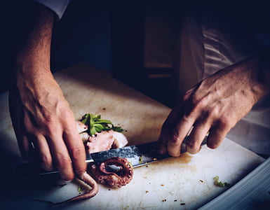 person slicing squid thumbnail