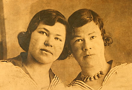 sepia photo of two women thumbnail