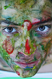 photo of painted human face thumbnail