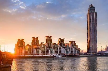 high rise buildings near body of water thumbnail
