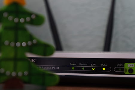 white and black TP-Link modem router thumbnail