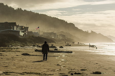 man standing at seashore thumbnail