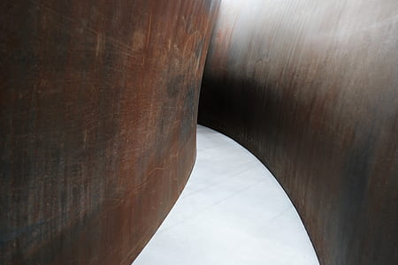empty pathway between brown walls thumbnail