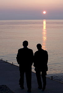 two men underneath golden hour thumbnail