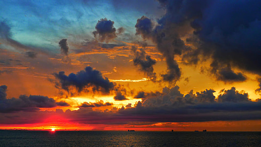 orange cloudy sky at golden hour thumbnail
