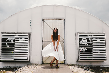 women's wearing white dress thumbnail