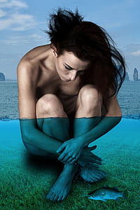 photo of naked woman in water with fish thumbnail