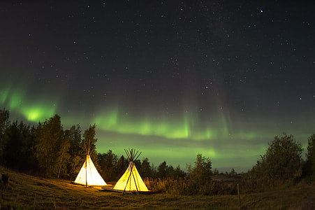 two lighted TP tent below green aurora boreales thumbnail