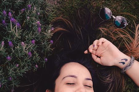 Woman Lying on Flower Field thumbnail
