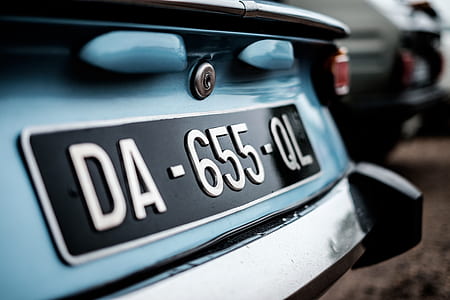 focus photography of car's license plate thumbnail