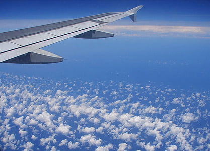gray airplane wing in air thumbnail