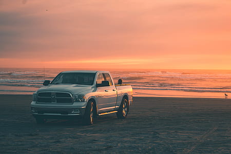 gray crew cab pickup truck underneath golden hour thumbnail