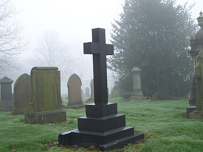 black concrete cross tombstone thumbnail