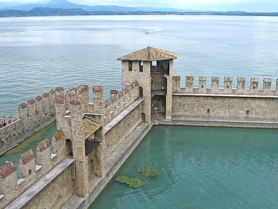 high-angled photography of gray concrete castle gate thumbnail