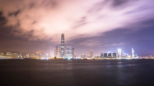 buildings under cloudy sky thumbnail