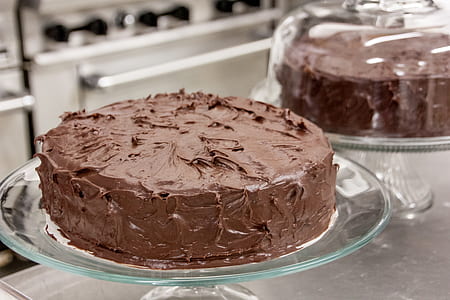 chocolate fondue cake on glass cake stand thumbnail