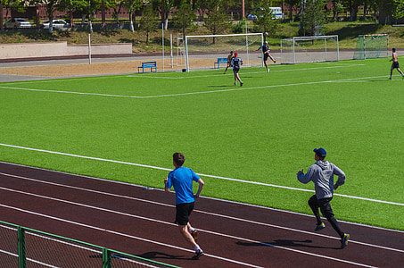 man running on track field thumbnail