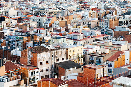 aerial photography of concrete buildings taken at daytime thumbnail