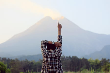 man raising right hand thumbnail