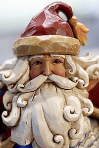 shallow focus photography of Santa Claus figure thumbnail