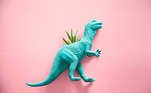 teal plastic T-rex figurine thumbnail