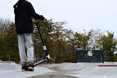 man holding bird scooter thumbnail