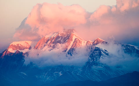 snow covered alps with clouds thumbnail
