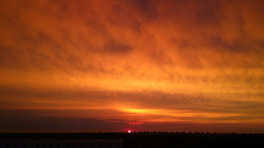 white clouds at golden hour thumbnail