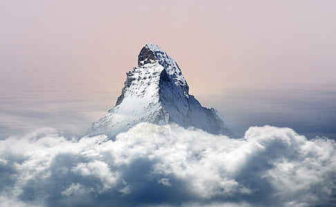 snow-covered mountain above clouds thumbnail