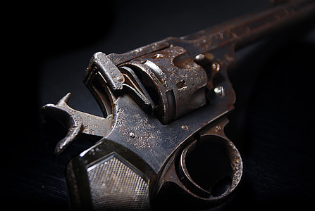 closeup photo of gray revolver thumbnail