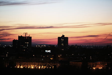 silhouette photography of high-rise building thumbnail