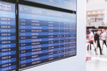 Info of flight on billboard in airport thumbnail